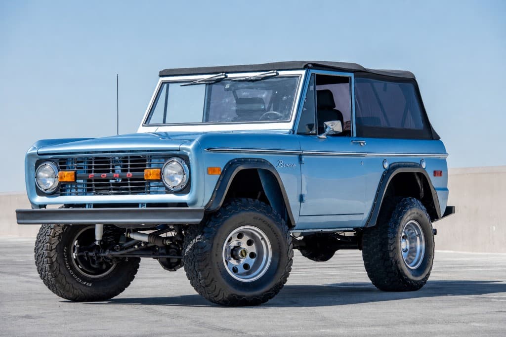 Restored light blue 1970 Ford Bronco Custom 4x4 front three-quarter view